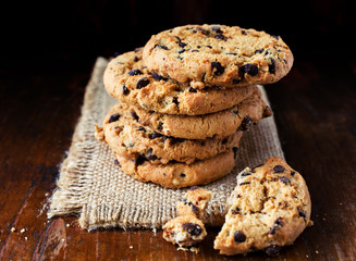 Chocolate chip cookies on old wooden table