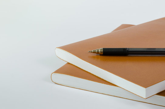 Leather Cover Notebook and Pen.