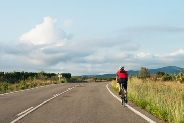 cyclist in seen highway of car