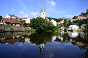 Obraz premium Czech Republic, village Rozmberk nad Vltavou with castle and reflection in Moldau river