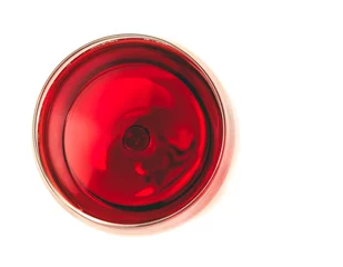 Wall murals Wine top of view of red wine in the glass isolated