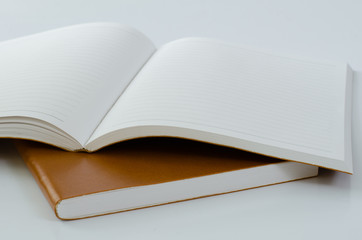 Notebook Open On White Background.