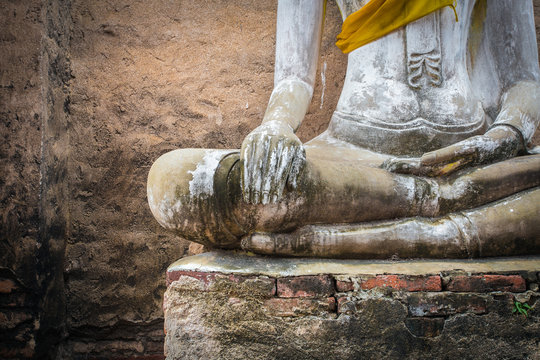 And old ruin buddha statue in Ayutthaya , Thailand
