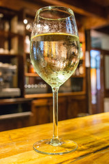 A close up of a glass of white wine