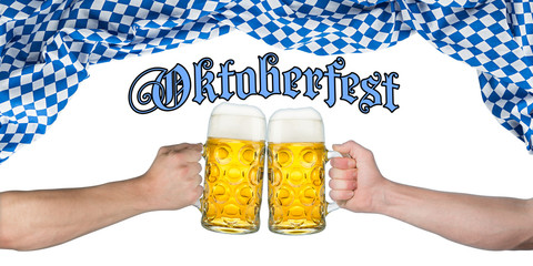 Oktoberfest / two hands holding beer mugs under bavarian flag isolated on white background