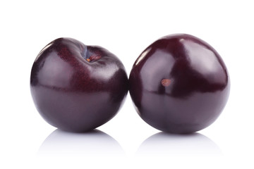 plums isolated on white