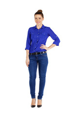 Fototapeta premium Portrait of a beautiful woman in blue jeans and blue shirt
