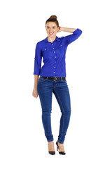 Fototapeta premium Portrait of a beautiful woman in blue jeans and blue shirt