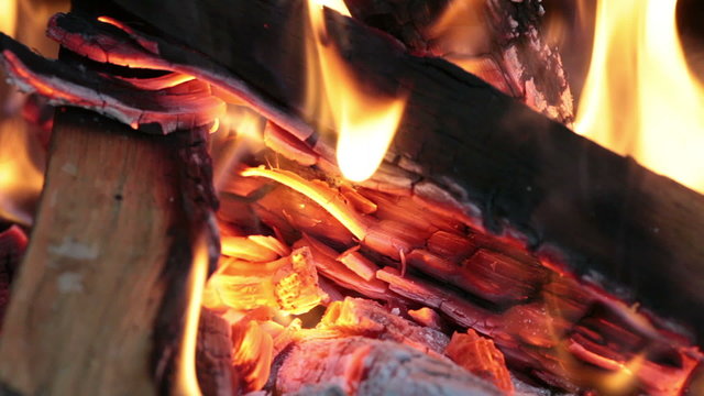 close up image of fireplace and wood burning