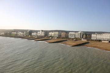 Fototapeta na wymiar View of sea, beach and tall buildings