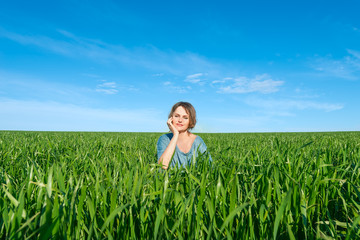 Woman enjoying  in green  field