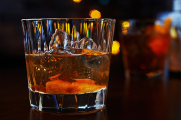 glass of delicious alcoholic cocktails or lemonade with ice