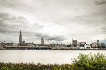 The skyline of Antwerp, Belgium with the Schelde river seen from Linkeroever
