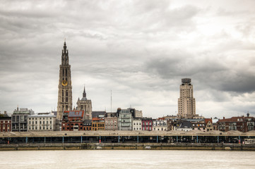 Fototapeta na wymiar The skyline of Antwerp, Belgium with the Schelde river seen from Linkeroever 