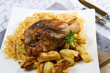 Baked pork shank with sauerkraut 