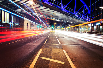 Fototapeta na wymiar Light trails in City of London with bridge
