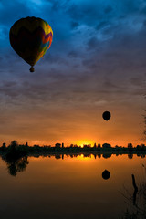 balloons at sunset over the lake