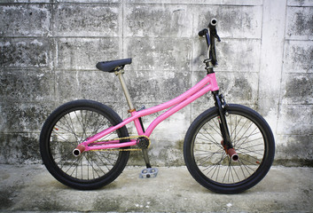 Fototapeta na wymiar bmx flatland bike pink color