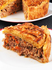 Quiche with meat and carrots