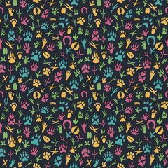Seamless pattern with footprint of birds and animals.