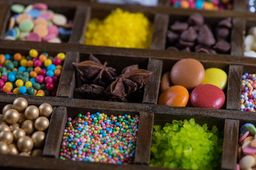 vibrant sugar cake decorations in box