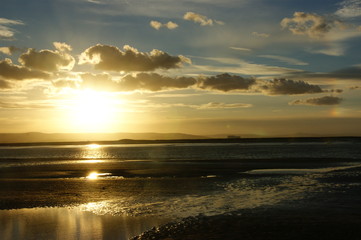 Obraz premium Golden sunset on the beach