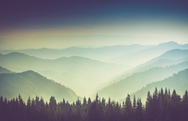 Layers of mountain and haze in the valleys.