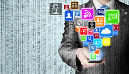 Business man using smart phone with social media icon set