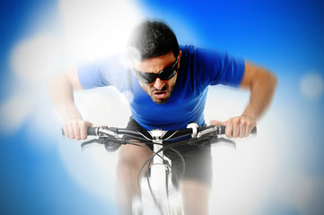 composite of young aggressive sport man riding mountain bike in frontal view