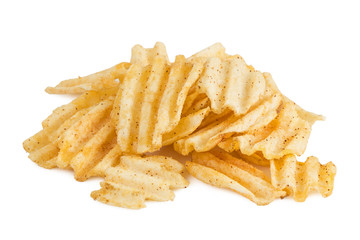 Closeup of heap of potato chips isolated on white background.