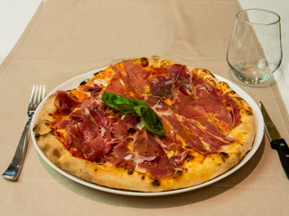 Delicious wood oven prosciutto pizza