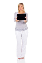 Fototapeta premium pregnant woman showing tablet computer