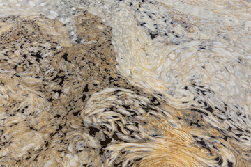 
Foam on the water after the dam