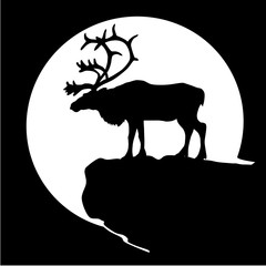 Black silhouette of a deer, like the caribou in front of the moon