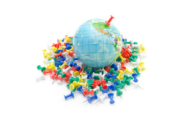 Globe on various push pin, isolated on white background