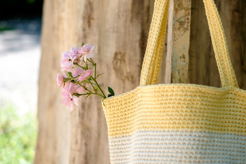 knitted crochet bag on the background of nature