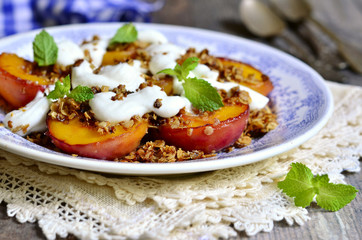 Grilled peachs with granola and whipped cream.