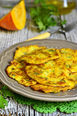 Pumpkin fritters with garlic and dill.