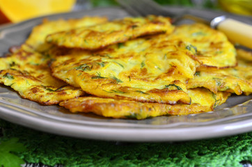 Pumpkin fritters with garlic and dill.