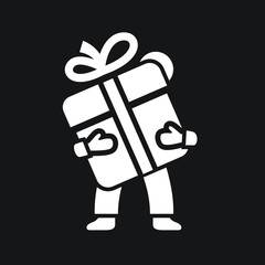 Man holds a gift box icon with bow.