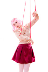 woman girl stylized like marionette puppet on string