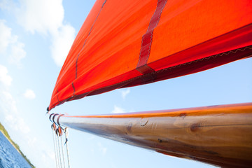 Wooden boat with sail