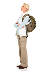 senior female tourist looking up