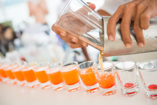 fresh orange juice in shot glasses
