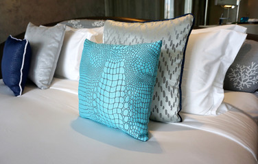 Fototapeta na wymiar crocodile skin blue fabric cushion