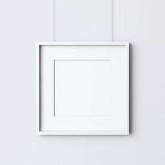 Empty frame on the white wall
