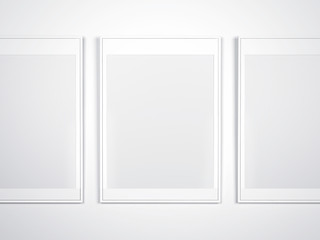 White wall with blank frames