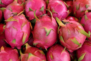 Group of dragon fruit in market.