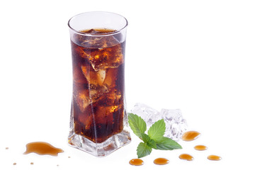 Cola in a glass, ice, mint. Isolation.