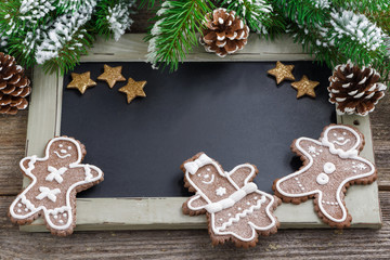 Christmas concept. Black board for text and gingerbread man